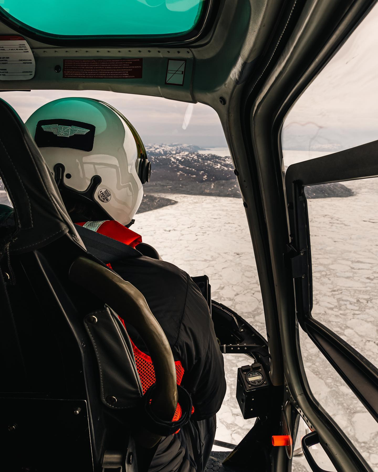On the #AS350 flying low above the Sermeq Kujalleq #icefjord #canoneosr6markii #eosr6markii #sigma24105art #greenland #helicopter