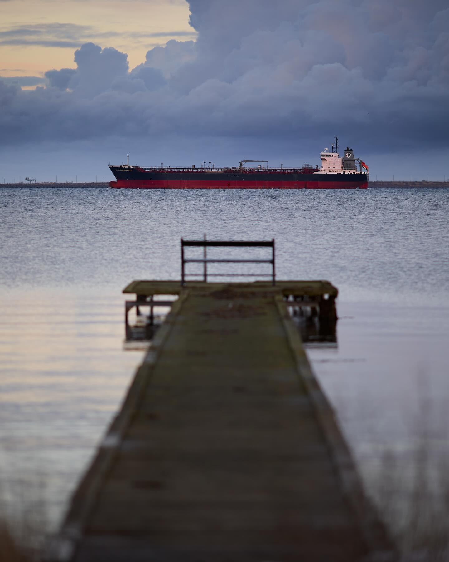 The 135 mm f/2 L may be the best portrait lens ever made by Canon. It is by no means considered a landscape lens. But for the fun of it I brought it on a walk along the water during twilight – locked down at f/2.  #canoneosr6markii #eosr6markii #canon135mmf2 #landscapephotography #ship #winter